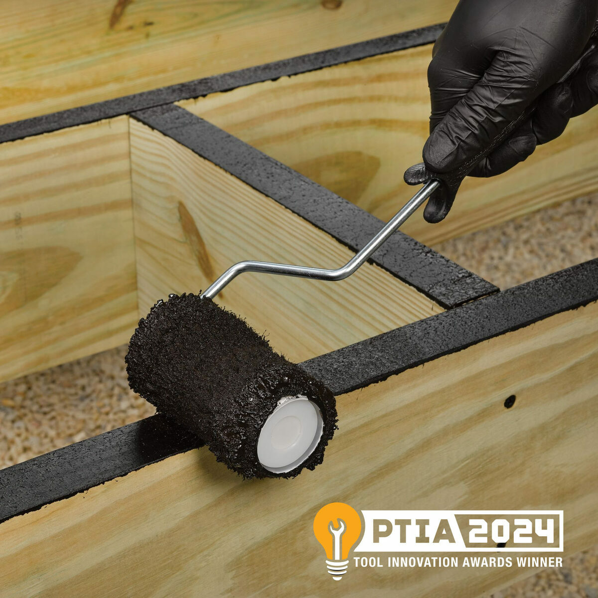 FastenMaster Deck Frame Coating being applied to deck framing